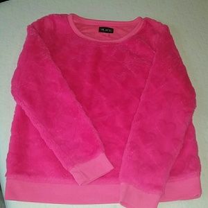 Hot pink, soft fleece like material.